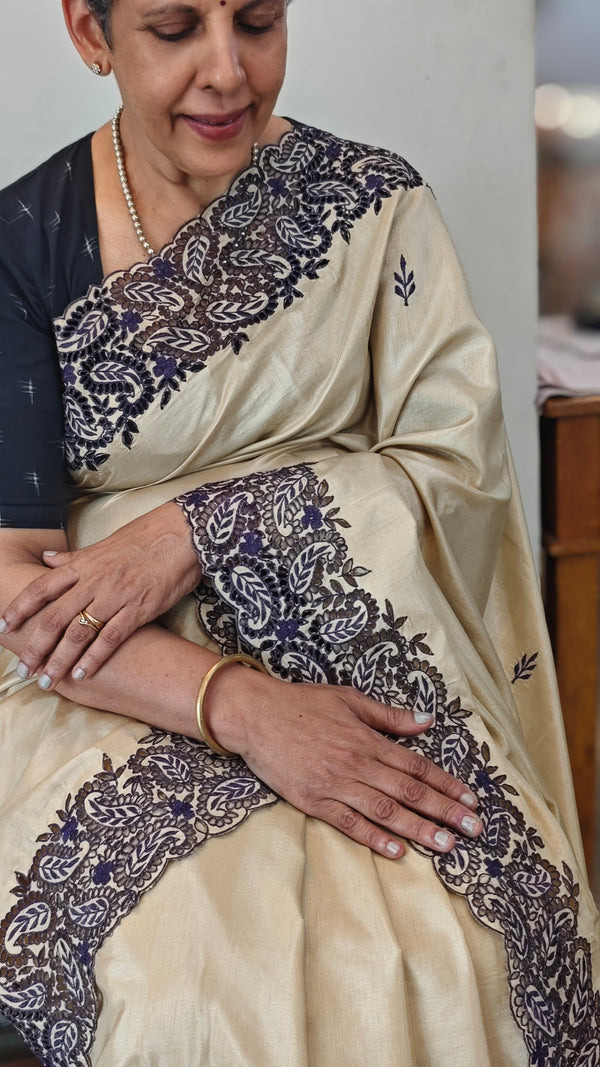 Beige semi silk cutwork saree