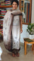 Cream and dark olive green printed linen suit