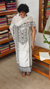 White and black embroidered cotton suit